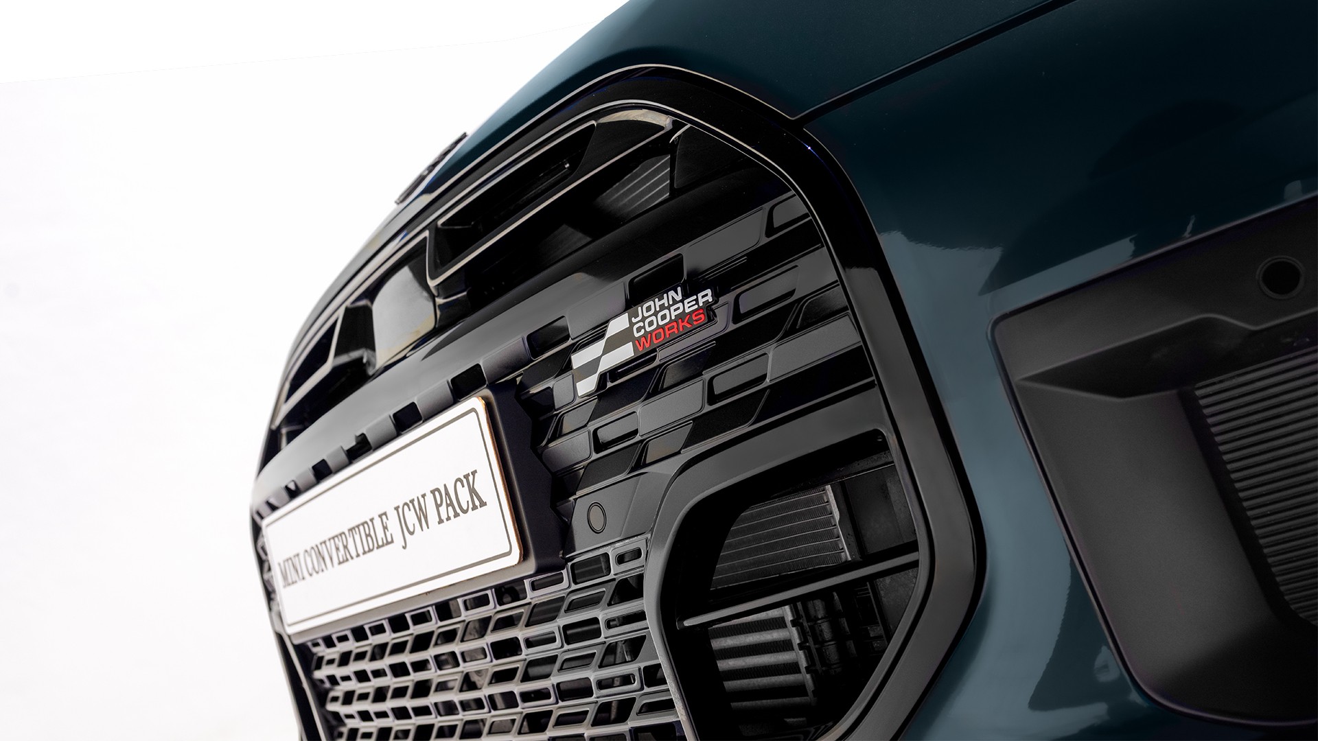 Top view of the MINI Cooper Convertible in Copper Grey with MINI Yours Roof parked on street